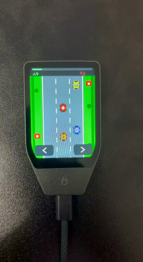 A Bitcoin racing game running on a Trezor Safe 7 while it generates a post-quantum signature